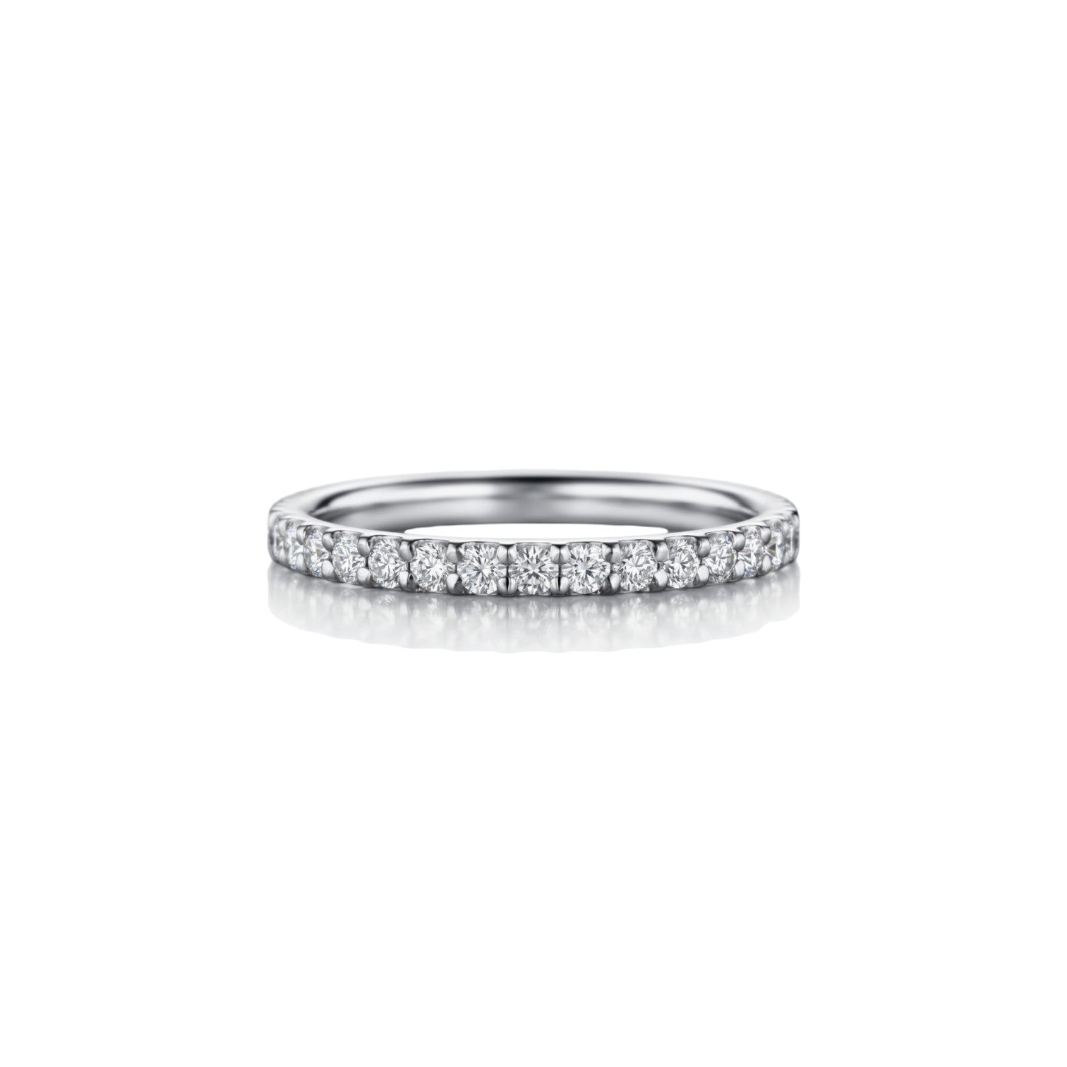 A classic pavé-set diamond wedding band in soft 18K White gold — Diamond Ateliers.