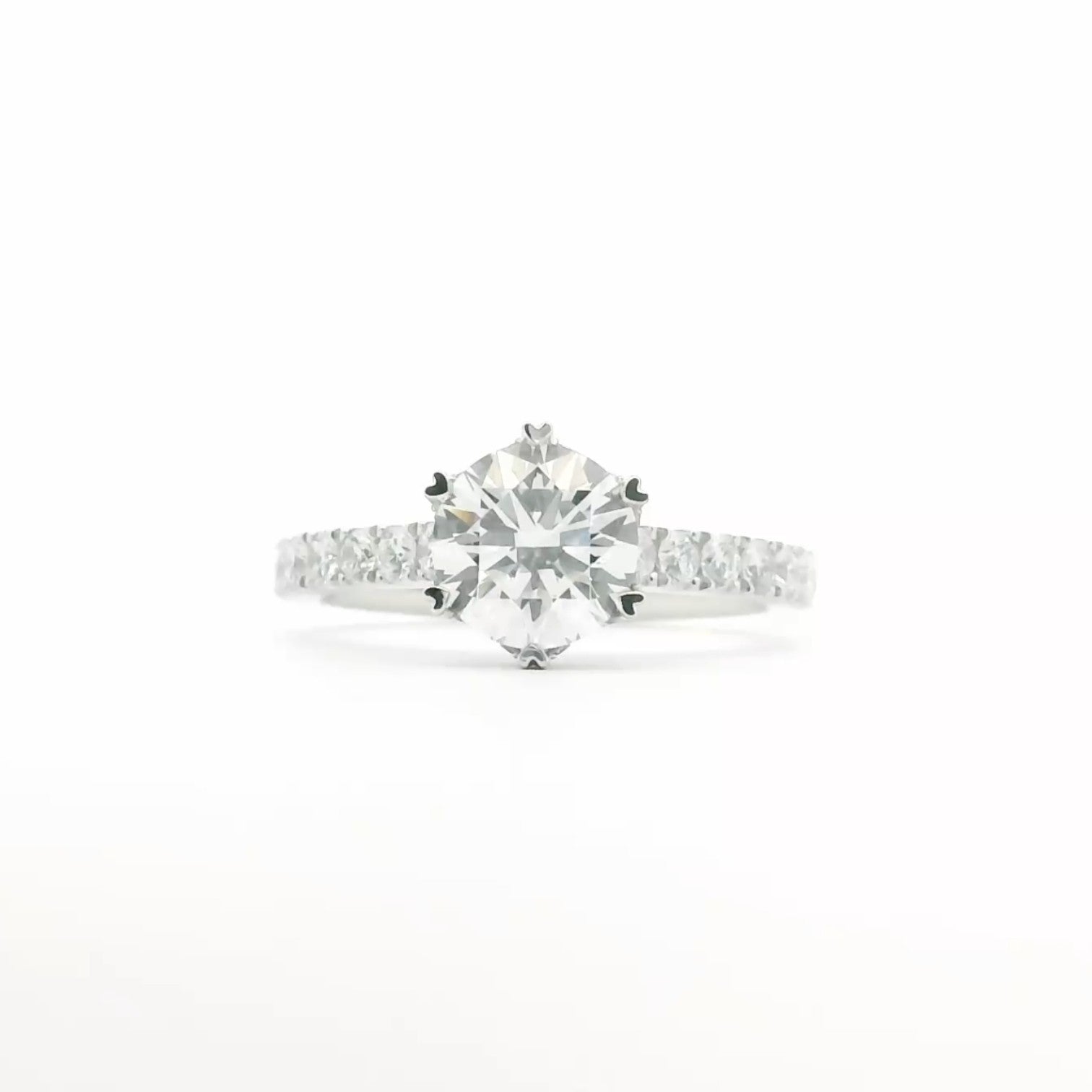 Six-heart-shaped prong pavé solitaire engagement ring in 18K white gold – Diamond Ateliers