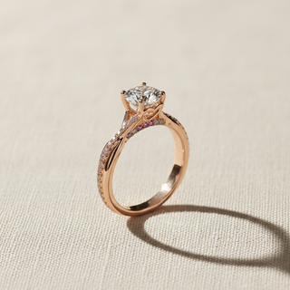 18K Rose Gold Twist Pavé Solitaire Engagement Ring with Pink Diamond Bridge - Image 1