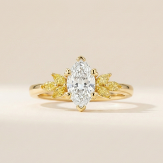 Marquise-cut diamond ring with yellow marquise diamond leaf clusters in 18K yellow gold. - Image 1