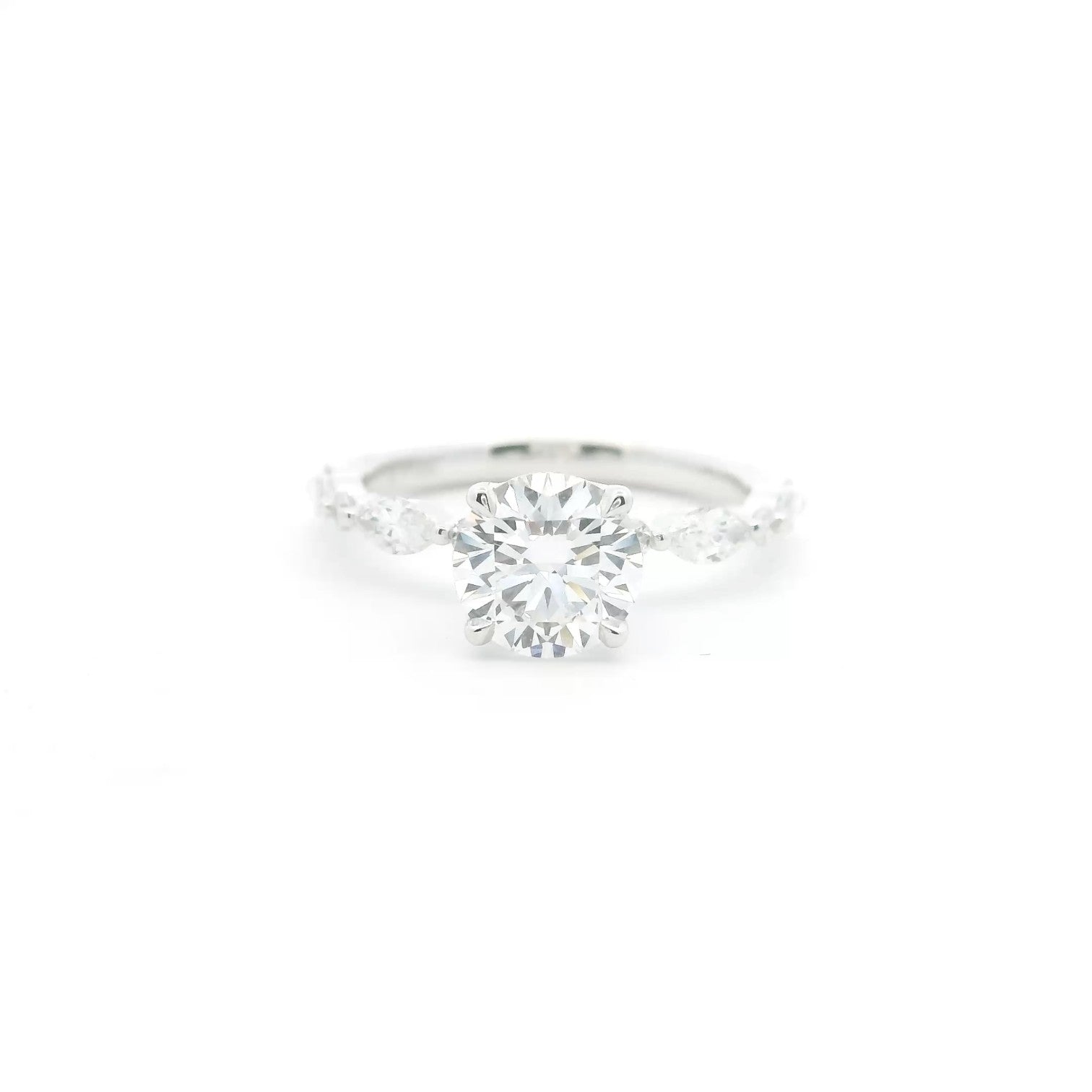 Round and marquise crown solitaire with four claw prongs in 18K white gold – Diamond Ateliers