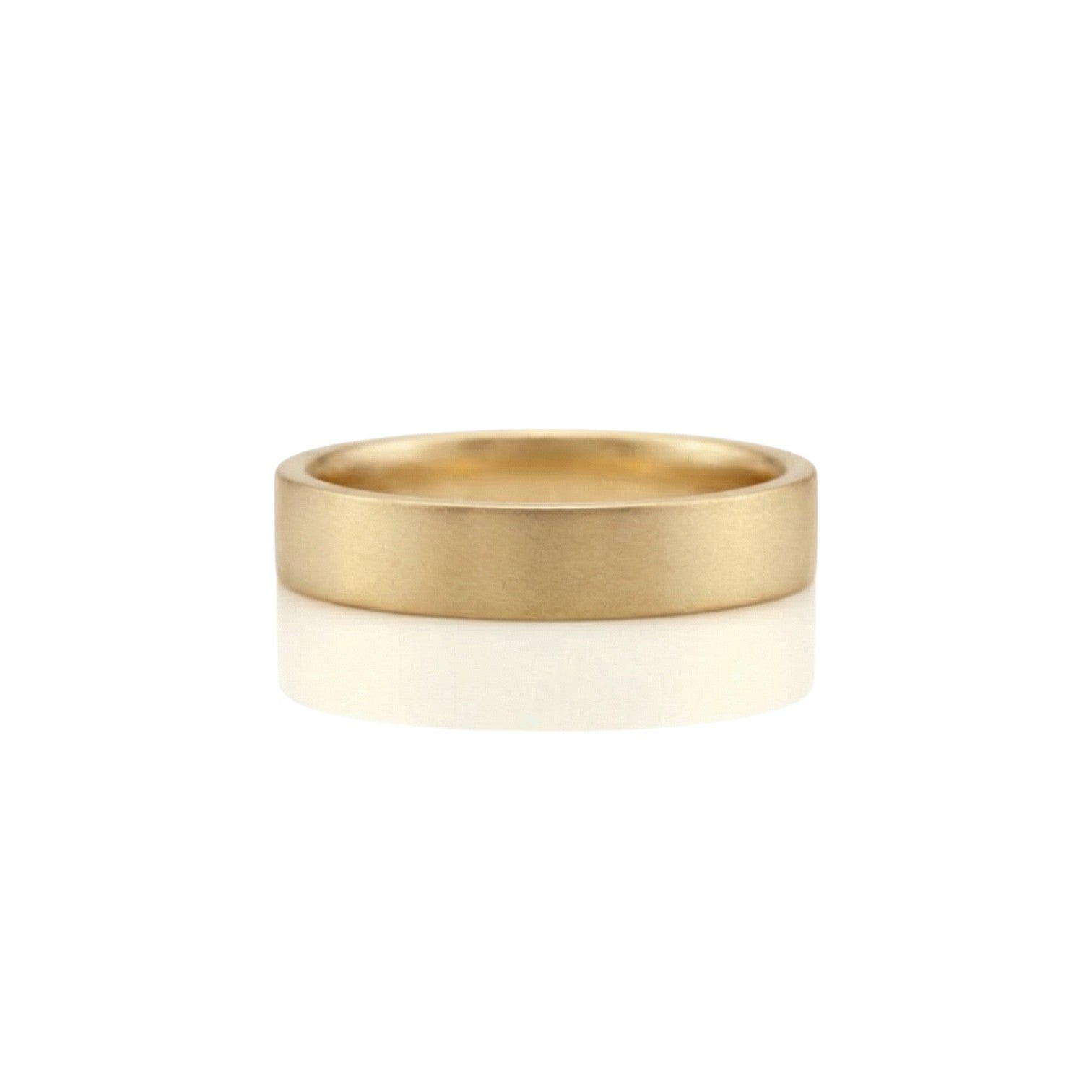 4mm flat matte wedding band in 18K yellow gold with brushed finish – Diamond Ateliers.