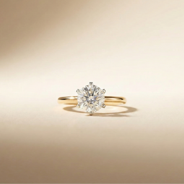 Copy of Classic 6-Prong Round Solitaire in Yellow Gold and White Gold Prongs