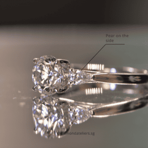 Stunning diamond ring with round and pear-shaped diamonds