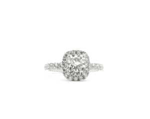 Halo cushion engagement ring with a 3/4 pave setting and sparkling diamonds in a white gold band.